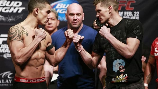 Stephen Thompson congratulates Robert Whittaker on an incredible win over Darren Till