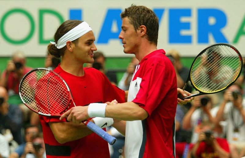 Roger Federer (L) with Marat Safin