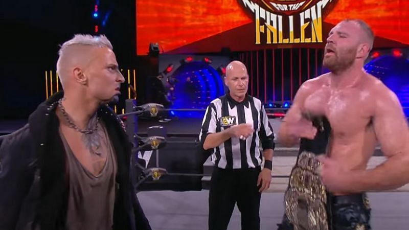 Darby Allin (left) with Jon Moxley following his return at Fight for the Fallen
