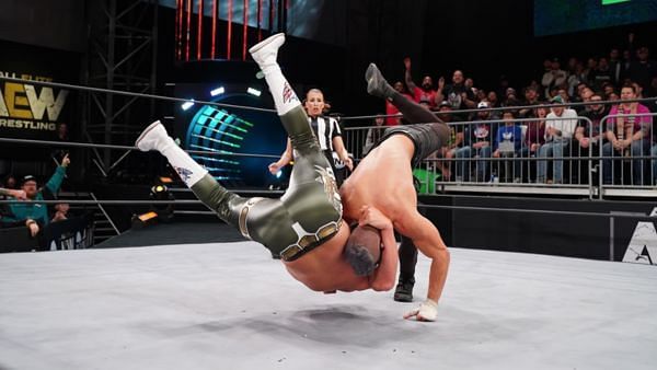 Cody hitting Dary Allin with the Cross Rhodes