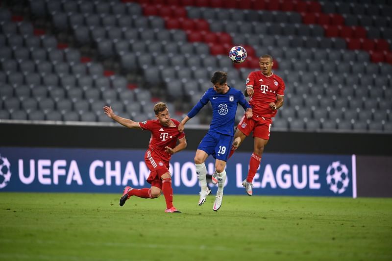 Joshua Kimmich and Thiago of Bayern Munich battle for possession with Chelsea&#039;s Mason Mount