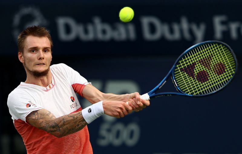 Alexander Bublik plays a backhand at Dubai