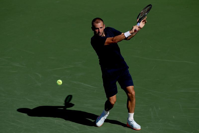 Dan Evans in action during his three-set win over Andrey Rublev