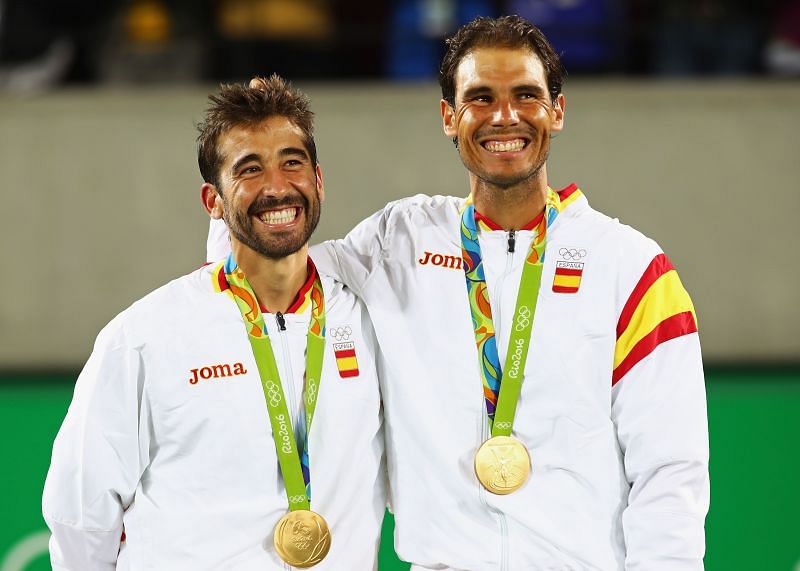 Rafael Nadal with Marc Lopez and their doubles gold medal at the Rio Olympics