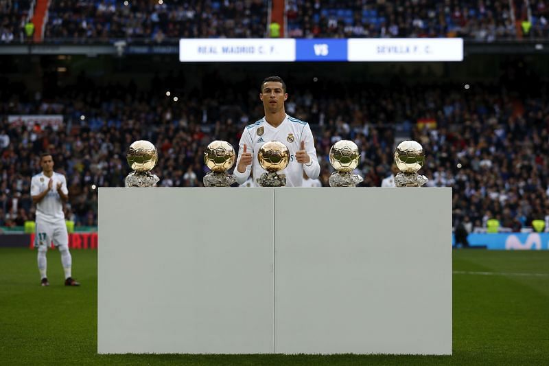 Ronaldo displaying his five Golden Ball awards at the Santiago Bernabeu