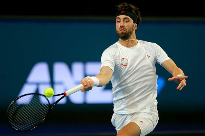 Nikoloz Basilashvili plays a forehand at 2020 ATP Cup