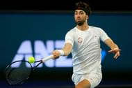 Nikoloz Basilashvili plays a forehand at 2020 ATP Cup