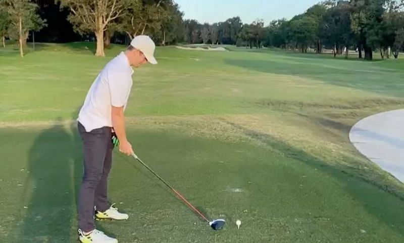 Steve Smith playing golf