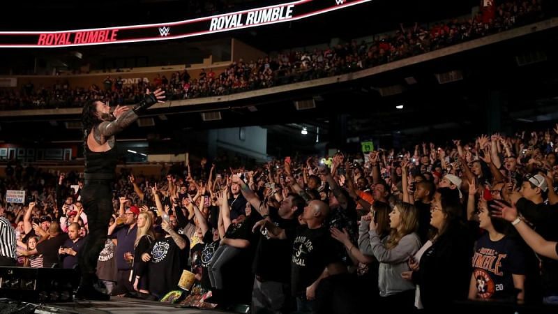 Roman Reigns soaks in the cheers at Minute Maid Park.