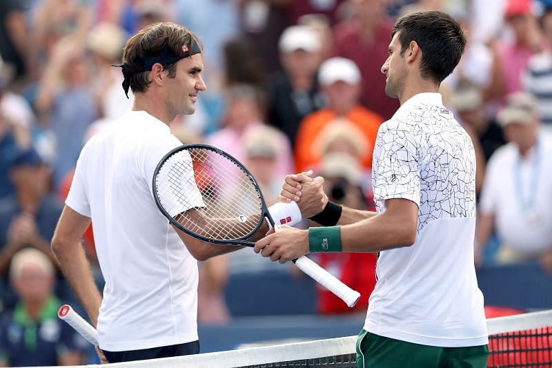 Roger Federer (L) and Novak Djokovic