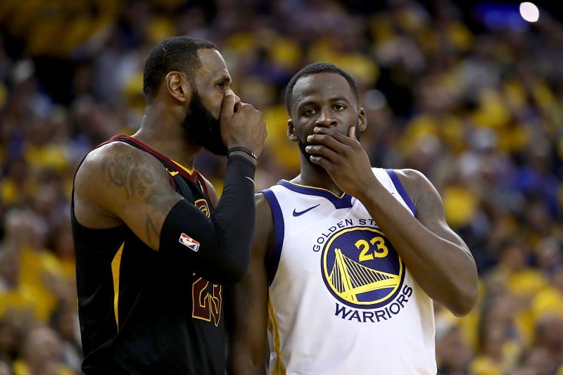 Draymond Green and LeBron James sharing a moment on the court