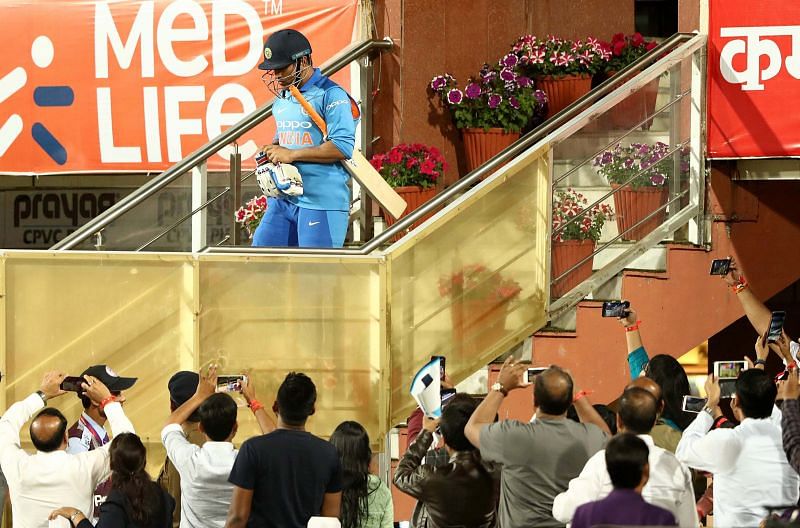 MS Dhoni walking out to bat in a match in Ranchi