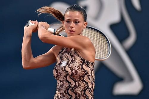 Camila Giorgi came through a near three-hour marathon in the quarterfinals