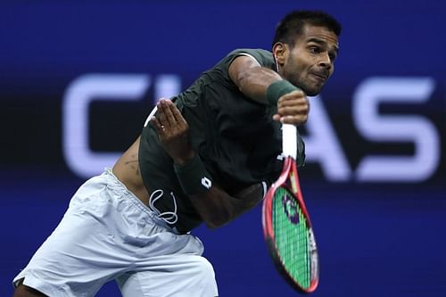 Sumit Nagal serves at 2019 US Open