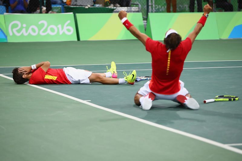 Rafael Nadal and Marc Lopez celebrating one of their wins