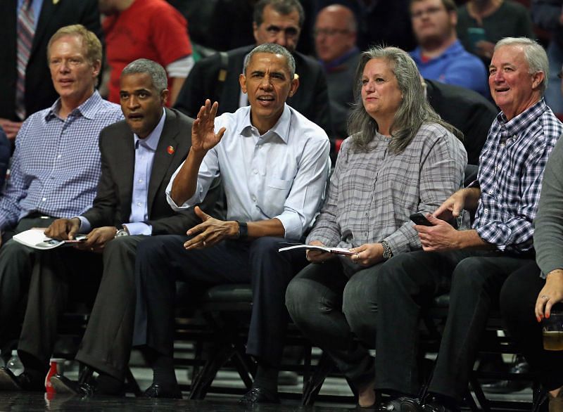 Former President Barack Obama sitting court-side at a Chicago Bulls game