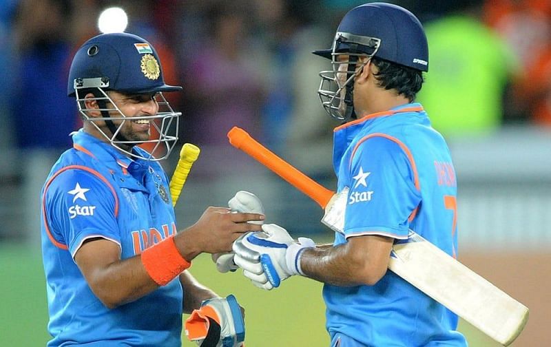 Suresh Raina and MS Dhoni after winning the match against Zimbabwe in the 2015 ICC Cricket World Cup