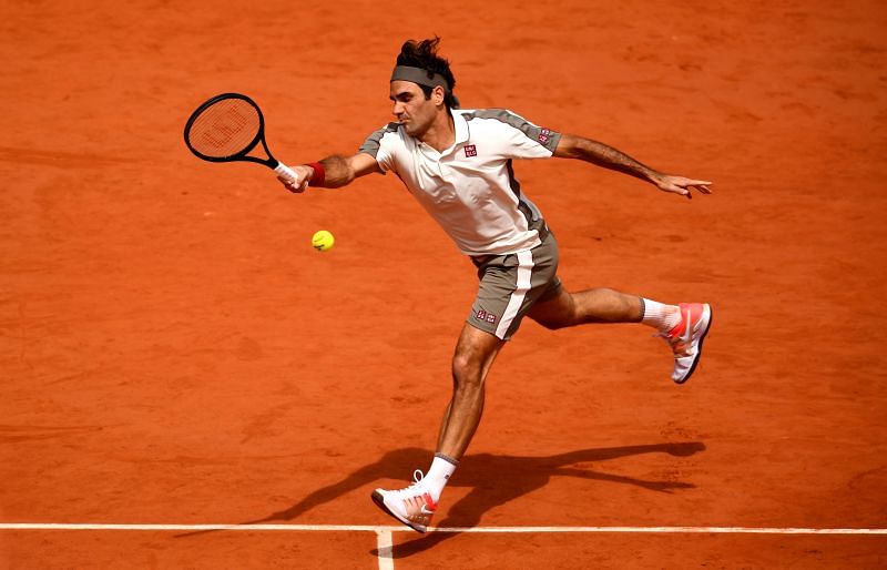 Roger Federer plays a forehand at 2019 French Open