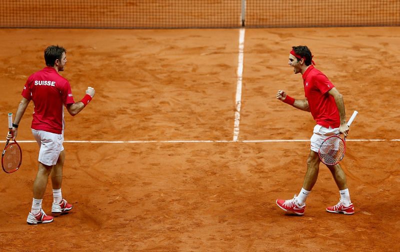 Roger Federer playing doubles with Stan Wawrinka
