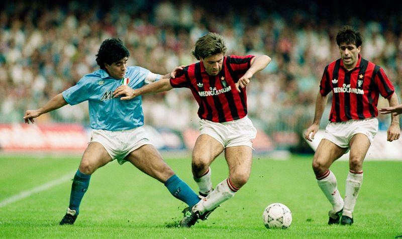 Diego Maradona and Carlo Ancelotti battling for the ball