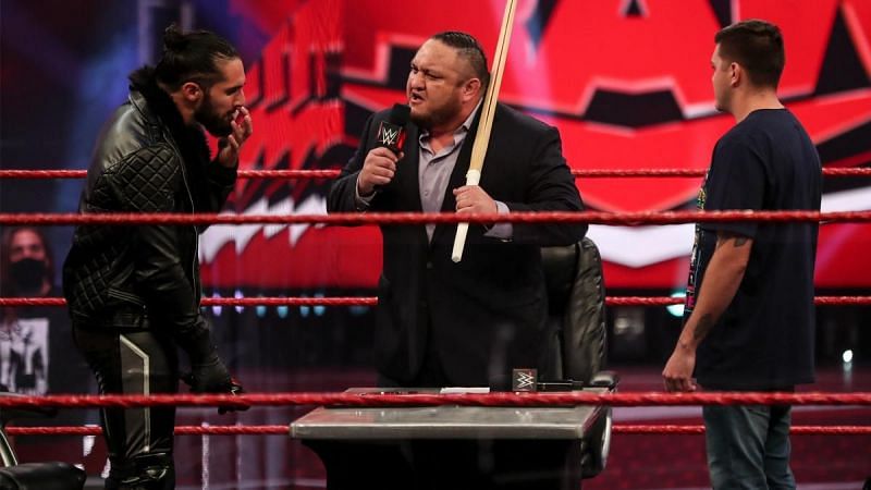 Samoa Joe and Seth Rollins during Dominik&#039;s WWE contract signing