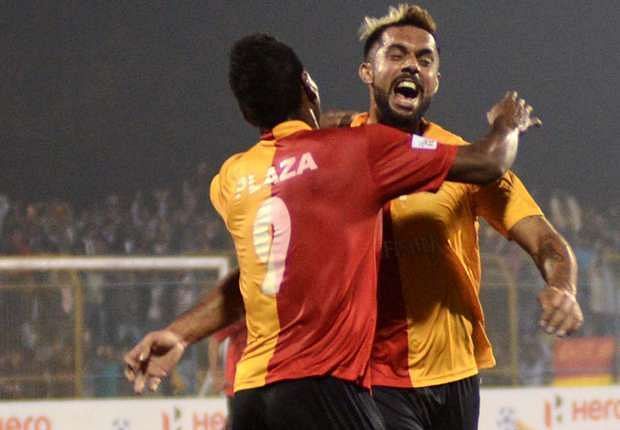 Robin Singh celebrates with Willis Plaza after scoring a goal for East Bengal