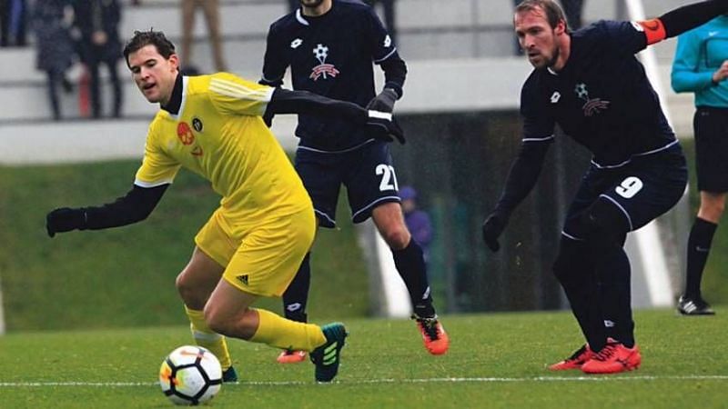 Dominic Thiem playing football