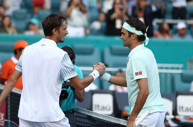 Daniil Medvedev (L) and Roger Federer at the Miami Open 2019