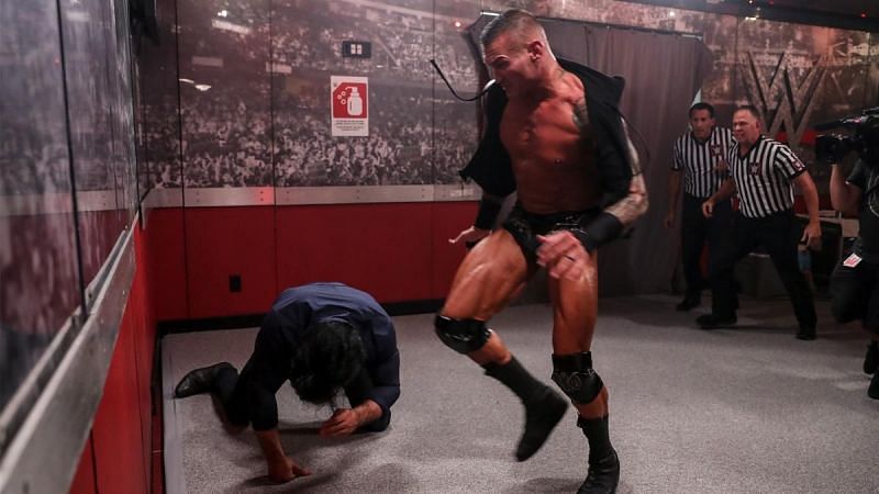 Randy Orton punting Drew McIntyre