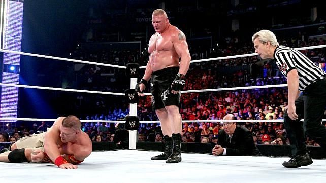 Lesnar standing tall over a defeated John Cena