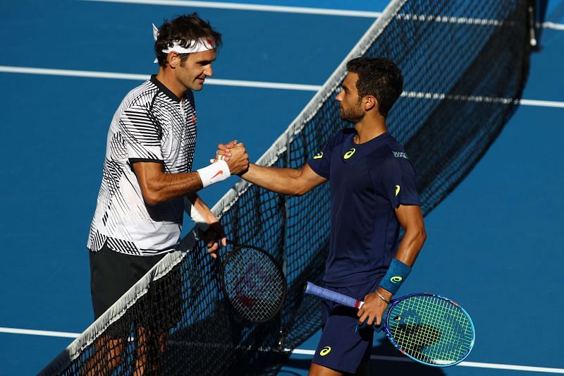 Roger Federer (L) and Noah Rubin at the 2017 Australian Open.