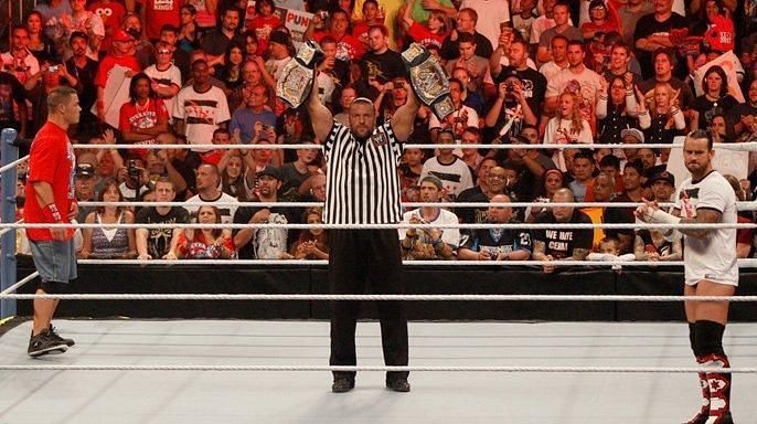 Triple H presiding as the special guest referee