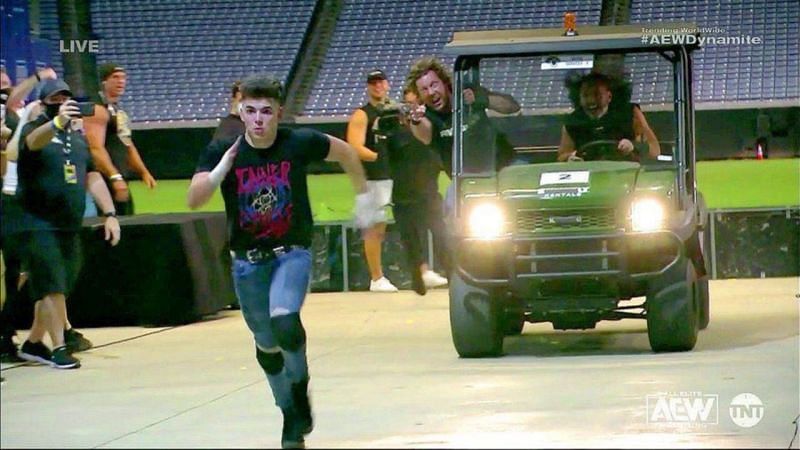 Sammy Guevara being chased down in a golf cart by Kenny Omega and Matt Hardy in AEW