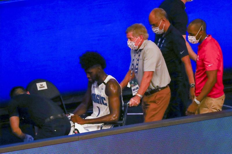 Jonathan Isaac being wheeled off the court