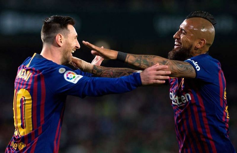 Lionel Messi (left) and Arturo Vidal (right) Enter caption