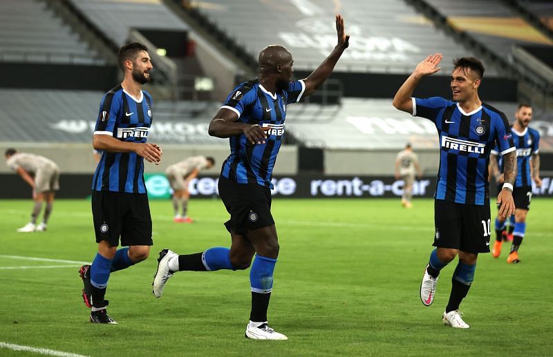 Lautaro Martinez (right) eased the pressure on Lukaku (centre) with some timely strikes
