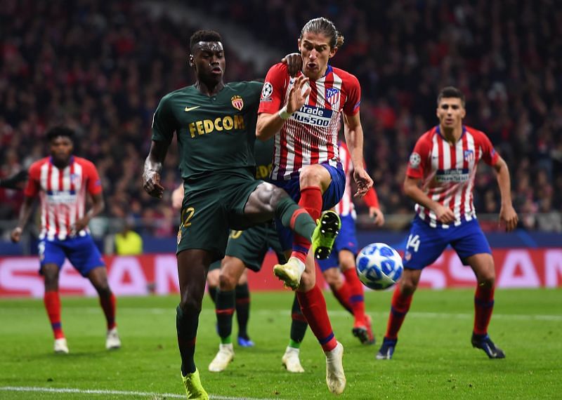 Badiashile (left) in action for Monaco