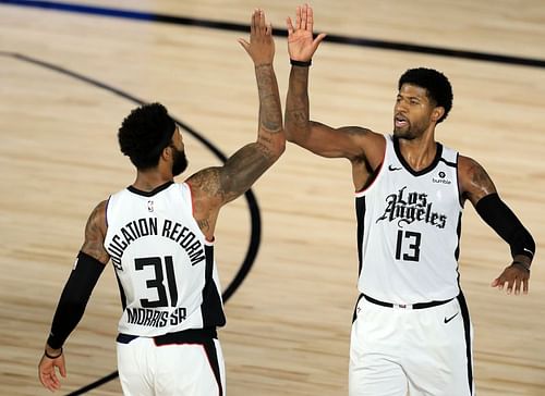 Marcus Morris Sr. and Paul George