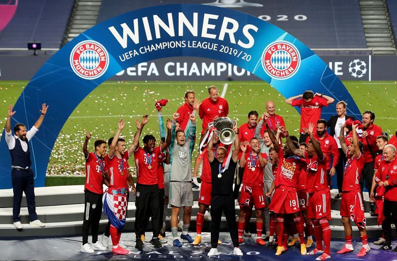Hansi Flick lifting the Champions League trophy in his first season in charge of Bayern Munich
