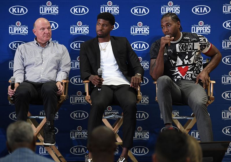 LA Clippers owner Steve Ballmer with Paul George and Kawhi Leonard