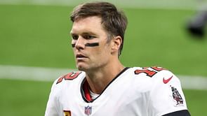 Brady brushes off losing debut after throwing two interceptions for Bucs