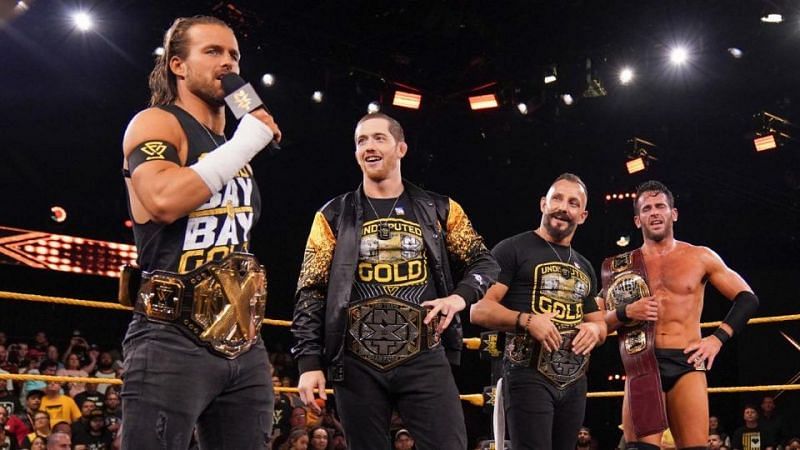 The Undisputed Era with all the available NXT Title belts