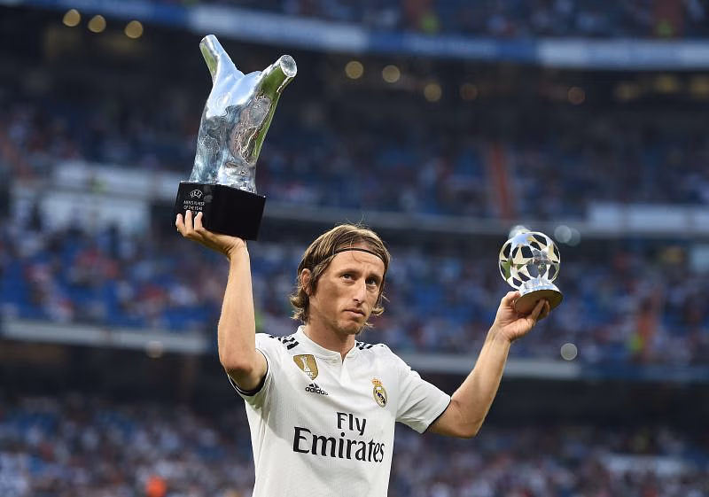 Luka Modric of Real Madrid celebrates with his 2017/18 UEFA Men's Player of the Year award