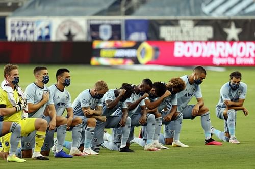 Sporting KC players kneel during the National Anthem in support of the Black Lives Matter movement