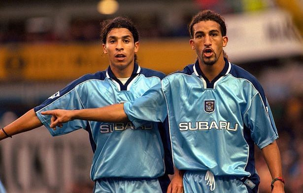 Morocco&#039;s Mustapha Hadji (right) became a cult hero at Coventry City.
