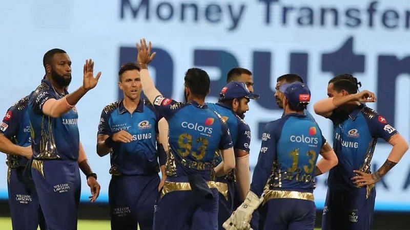 Mumbai Indians&#039; team celebrates after picking a wicket. (Image courtesy: Hindustan Times)