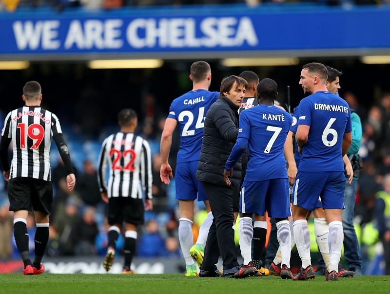 Antonio Conte embracing N'Golo Kante during his time in the Premier League