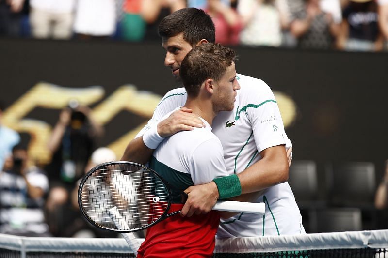 Diego Schwartzman (L) and Novak Djokovic at the 2020 Australian Open