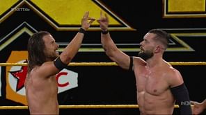 Adam Cole reacts after losing the NXT Championship match to Finn Balor