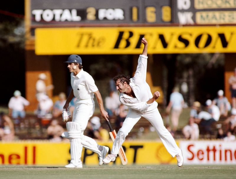 Dennis Lillee of Australia bowls